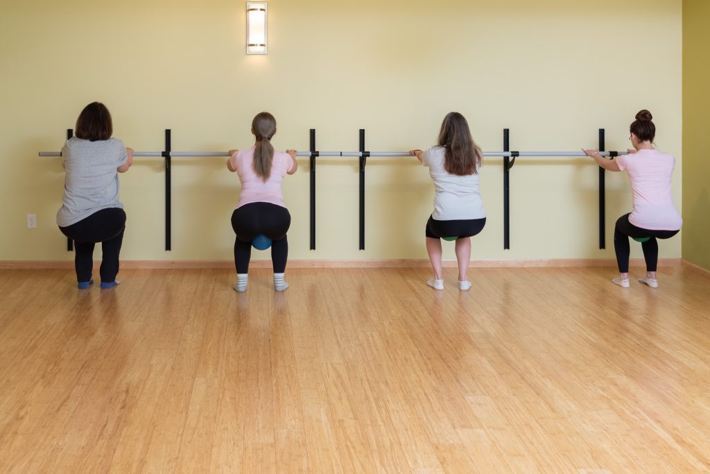 Group barre class at the barre at Serenity studio, Iowa City