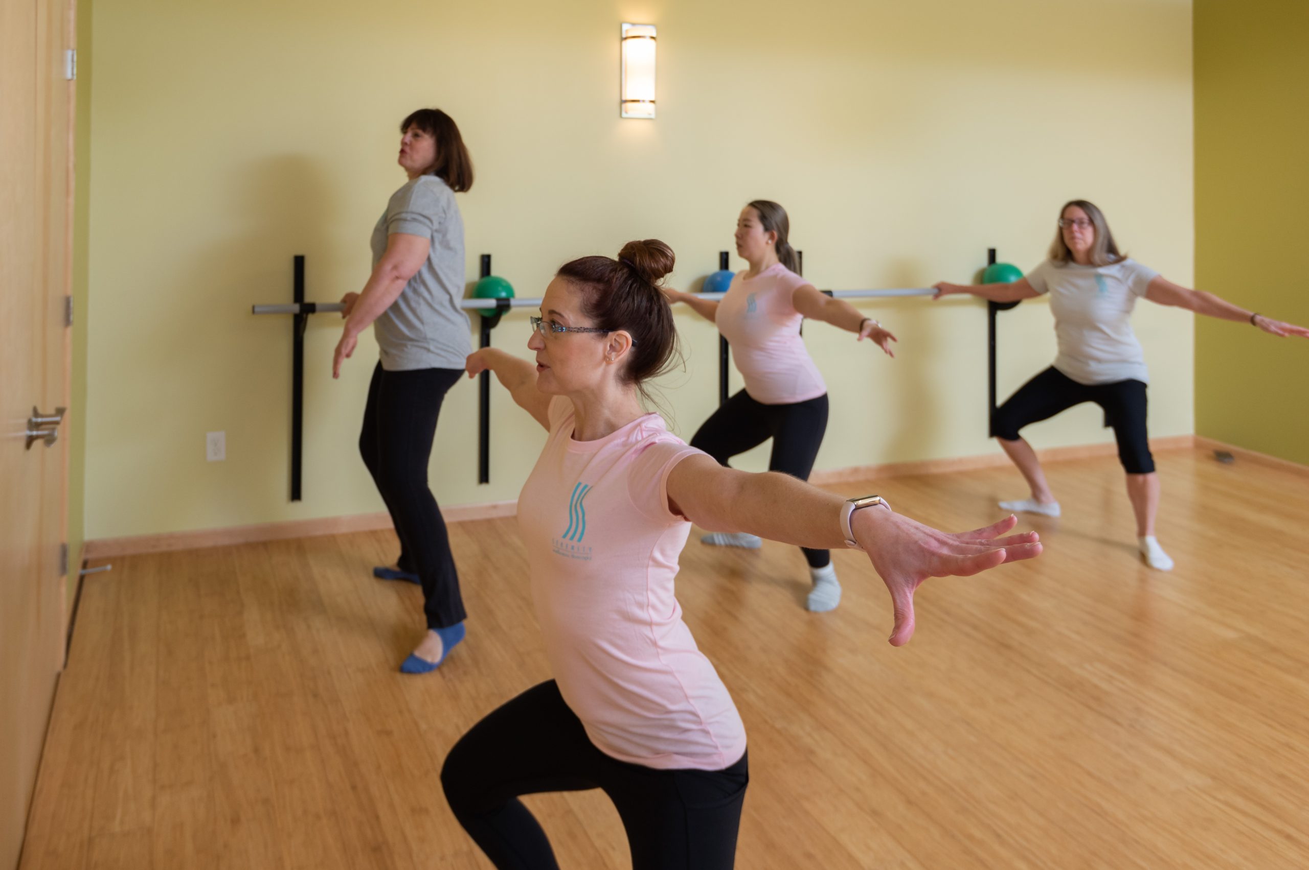 Marcie Evans leading a barre class at Serenity studio in Iowa City