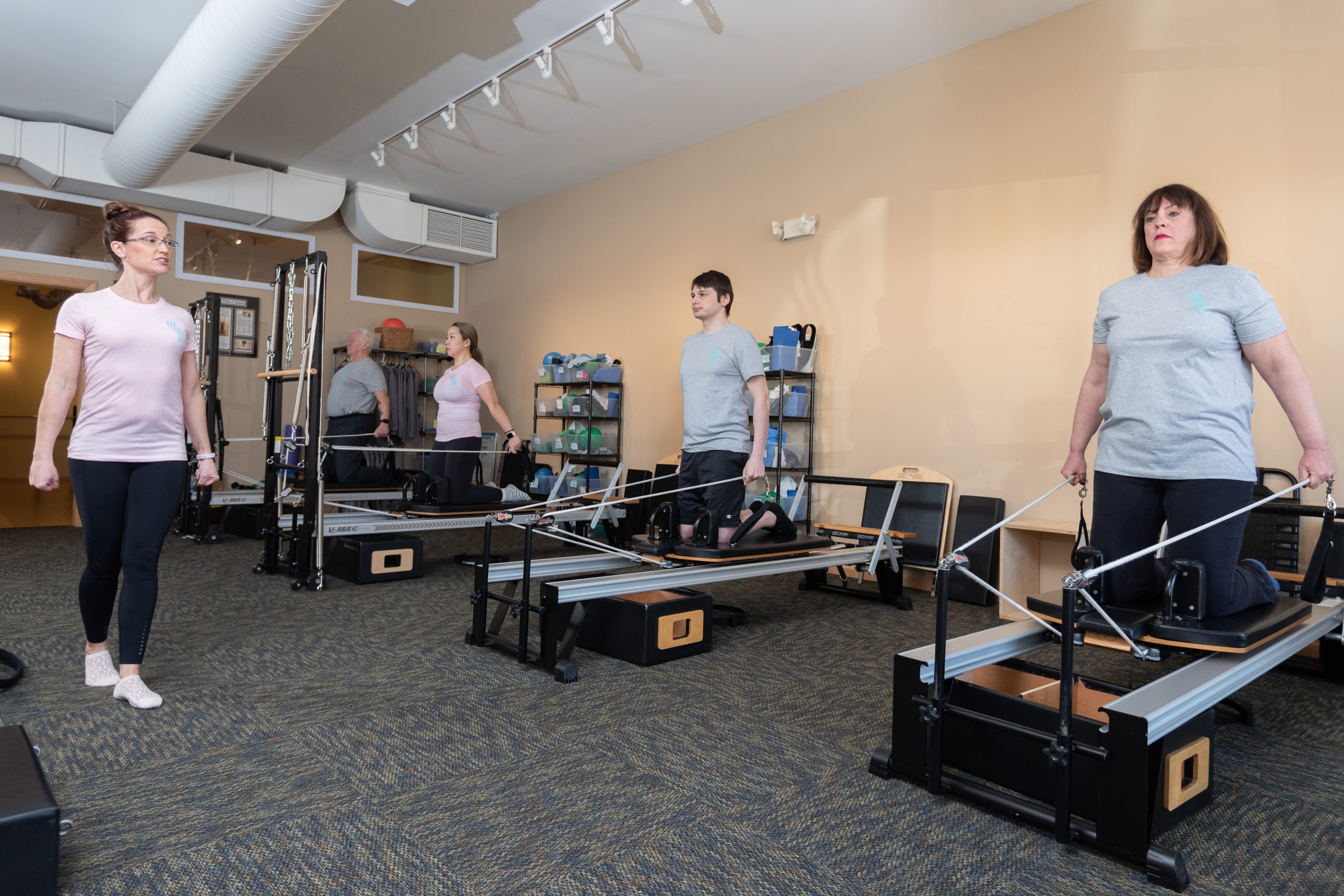 Group reformer Pilates class at Serenity studio in Iowa City